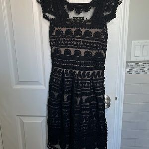 Gorgeous black lace with side zipper and nude lining dress!
